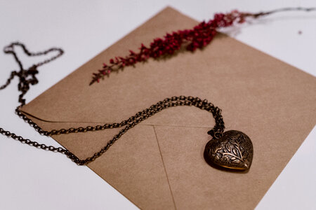 Heart necklace on a craft envelope photo