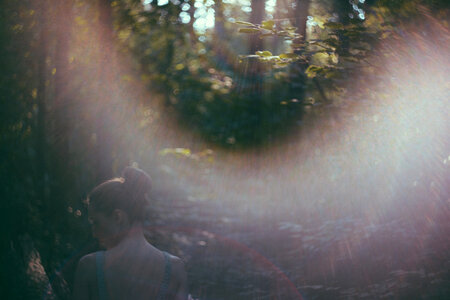 Helios shot of a girl with a sunflare photo