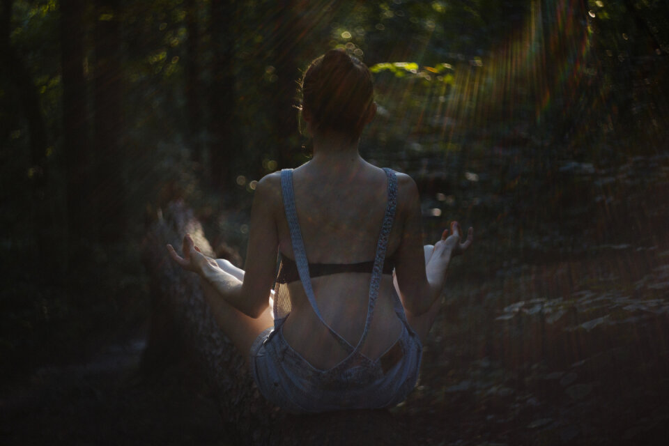 Helios shot of a girl meditating