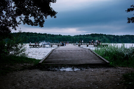 People on the pier in the evening