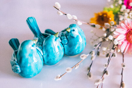 Ceramic birds and Easter palm photo