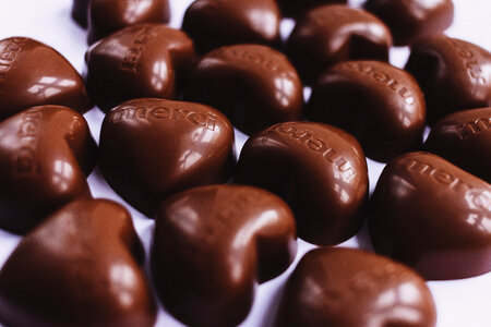 Heart shaped chocolates closeup photo