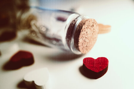 Message in a bottle and wooden hearts 2 photo