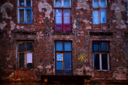 Old red brick tenement house photo
