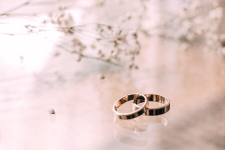 Wedding rings on a glass table