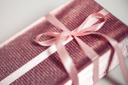 Pink Christmas gift blurred photo