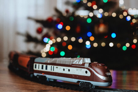 Toy train going around the Christmas tree 4 photo