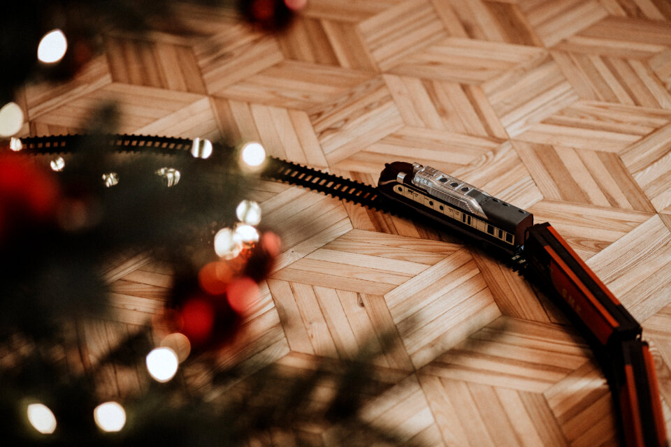 Toy train going around the Christmas tree 3