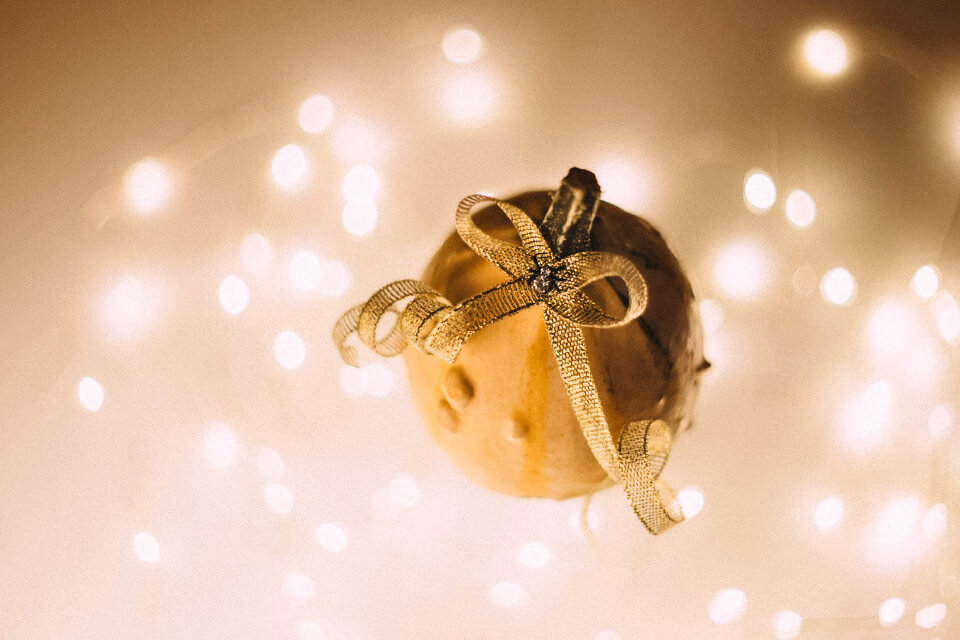 A halloween pumpkin with a spider jewel photo