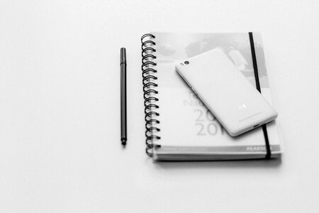 A planner and a phone 2 photo