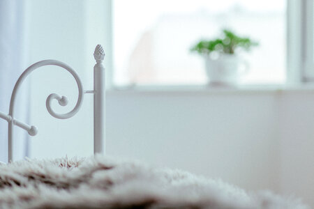 Vintage white bed detail photo