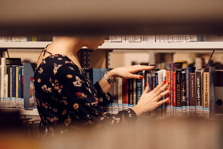 Girl in a library 4 photo