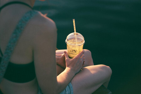Girl drinking smoothie 2 photo