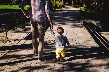 Father and son walking photo