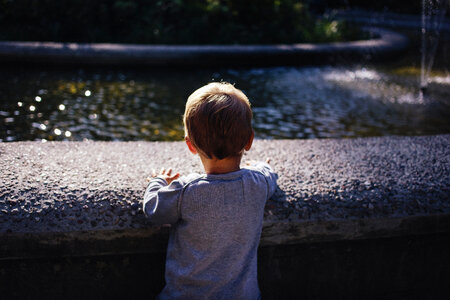 Boy at a fountain