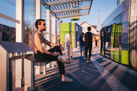 People at tram stop photo
