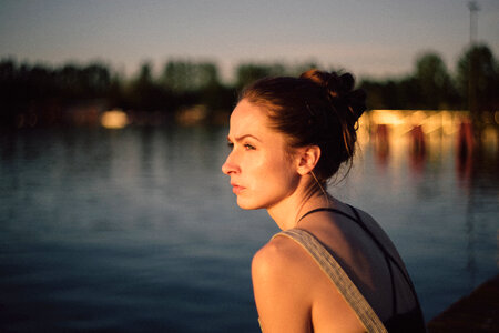 Pensive girl at the lake photo