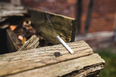 Cigarette on wood photo