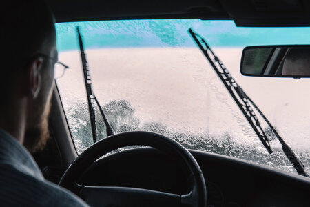 Man driving on a rainy day 2 photo