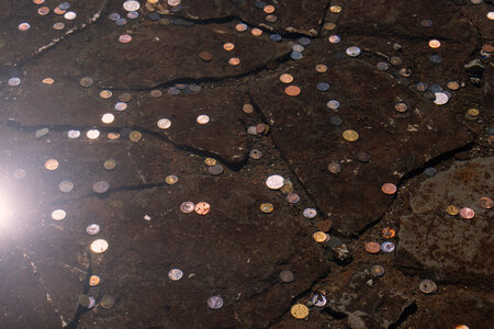 Coins in a fountain photo