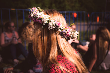 Girl wearing flowery crown photo