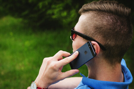 Young man talking on the phone 4