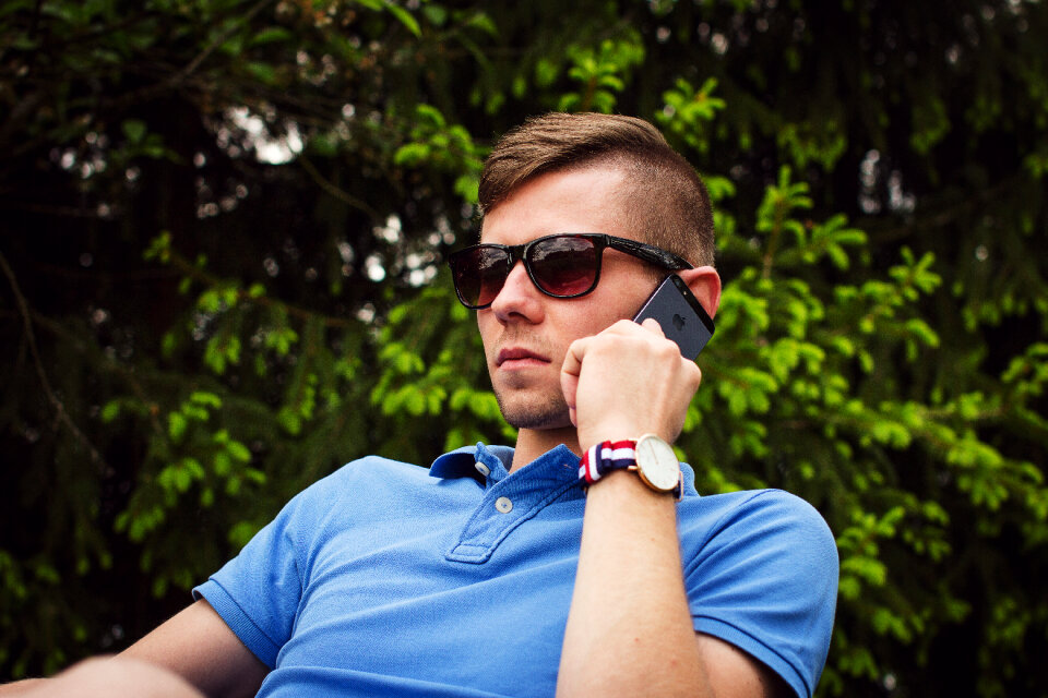 Young man talking on the phone 2
