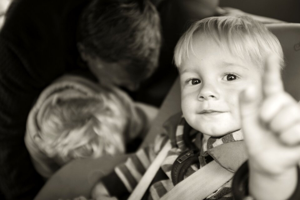 Grayscale Photography of Kid Pointing