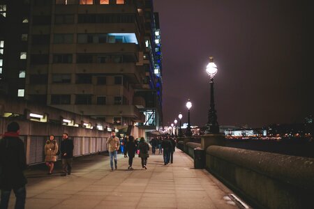 Free stock photo of light post, people walking, riverside photo