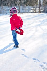 Toddler Walks on Snow photo