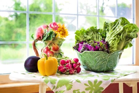 Yellow Bell Pepper Beside Red Cherry Tomato Near Green Ceramic Bowl photo