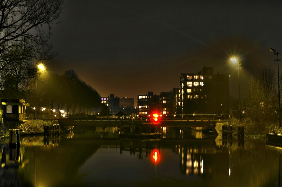 Buildings Near Light Post during Night Time