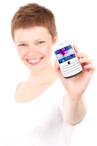 Woman Holding White Qwerty Phone photo