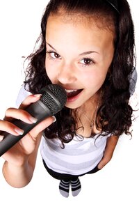 Woman Holding Black Microphone photo