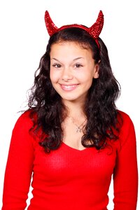 Woman in Red Top and Horned Headband photo
