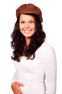 Woman Wearing Brown Cap and White Long Sleeve Shirt photo