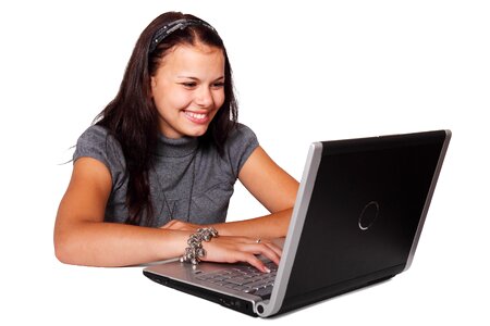 Woman in Turtle Neck Shirt With Grey and Black Laptop Computer photo
