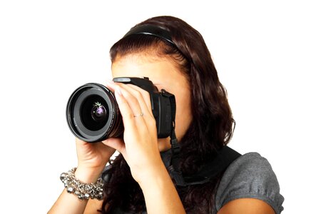 Woman in Grey Shirt Taking Picture With Dslr Camera photo
