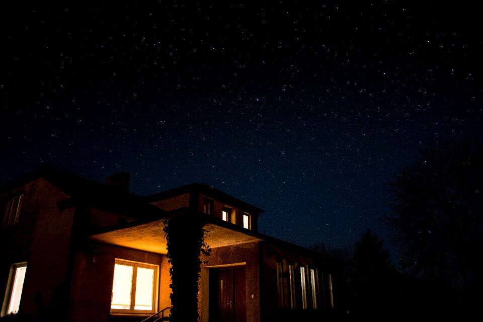 Black Lighting House during Night Timw