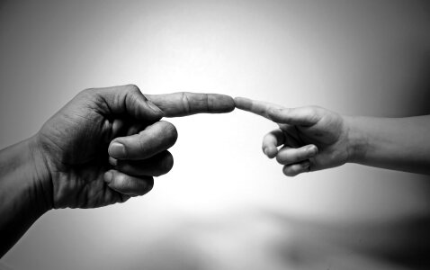 Grayscale Photo of Human Aligning Fingers photo