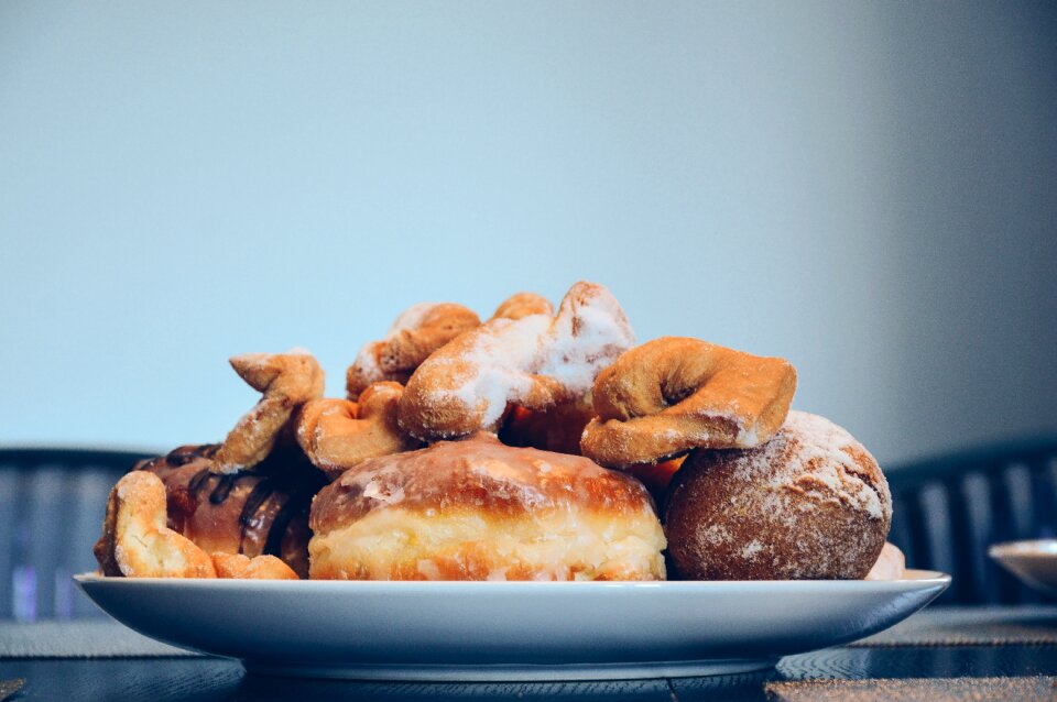 Varieties of Bread on White Ceramic Round Plate photo