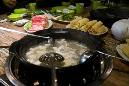 Food With Broth on Black Pot