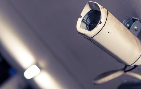 White and Gray Surveillance Camera in Macro Photography photo
