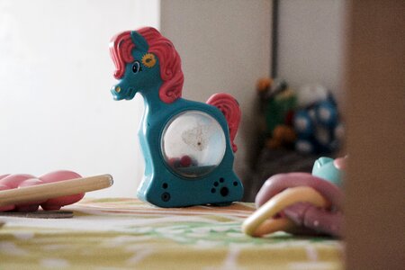 Free stock photo of baby, horse, toy photo