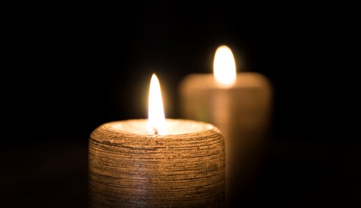 2 Lighted Candle in Lit Room