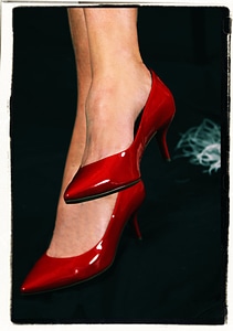 Feet red stilettos photo