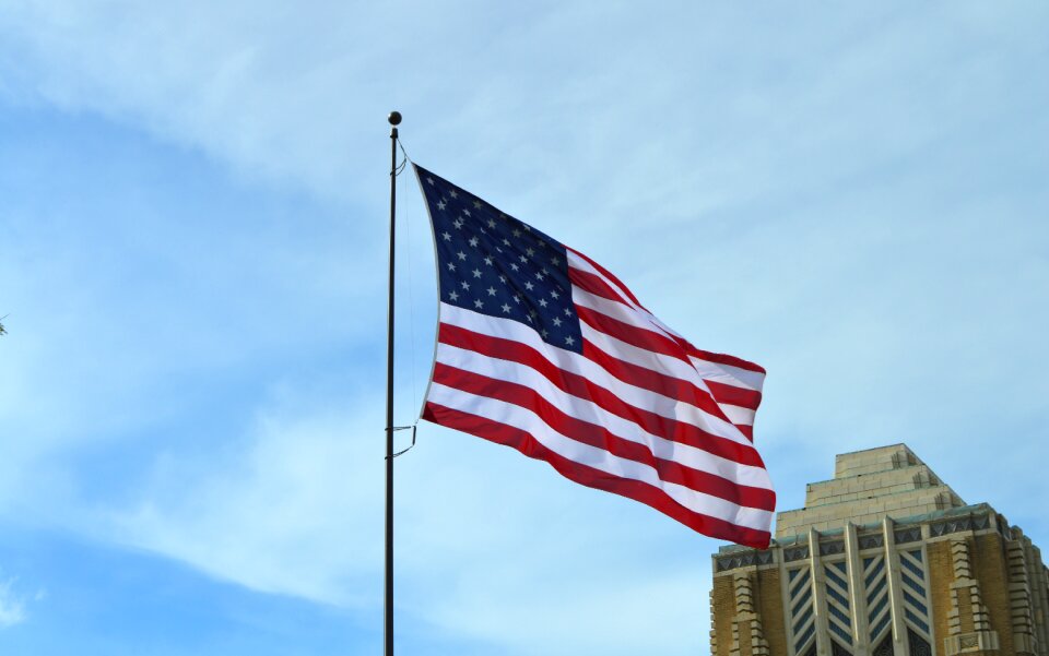 America Flag Under Blue Sky at Daytime