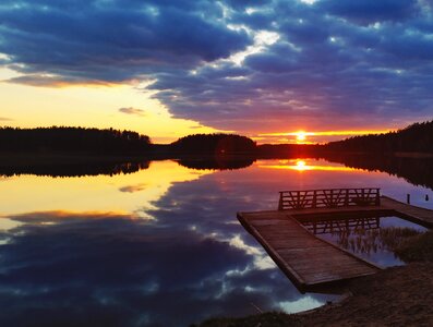 Brown Wooden Dock on Body of Water during Golden Hour photo