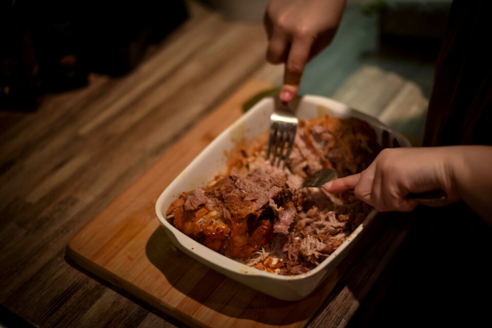 Person Mixing Cook Meat on White Food Container