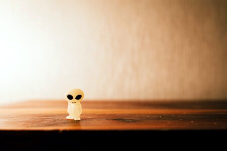 Free stock photo of alien, figurine, night photo